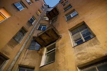 Aufkleber - residential stone old house in the city in the evening