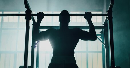 cinematic slow motion shot of a professional young muscular shirtless african man is practicing shad