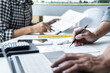© Freedomz - Architecture Engineer Teamwork Meeting, Drawing and working for architectural project and engineering tools on workplace, concept of worksite on technical drawing structure and construction