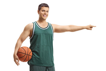 Poster - Basketball player in a jersey holding a ball and pointing to one side