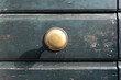 Classic retro brass door knob on green door vintage decoration retro interior style