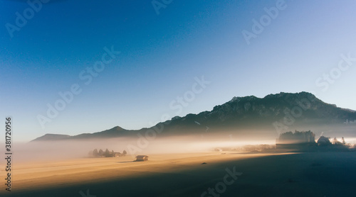 Fotomural Morning lowland covered with fog