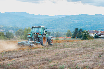 Poster - Selective focus shot of a tractor in a rural area