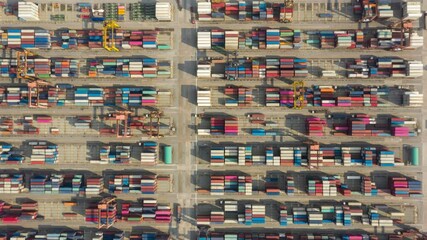 Sticker - Time lapse Container , container ship in export and import business and logistics. Shipping cargo to harbor by crane. Water transport International. Aerial view and top view.
