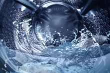 Washing machine drum with water, closeup view