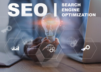 Poster - Businessman Holding Lightbulb Sitting In Office, Seo Collage With Text