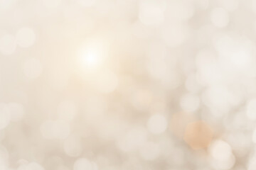 Cream blurred christmas lights background. Design effect focus happy holiday party glow texture white wallpaper bokeh sun sunny star shiny soft plain warm flare blur night light new year.