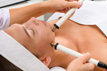 Microcurrent hardware therapy at beauty spa salon