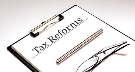 Poster - Papers with text, TAX REFORM on table, business concept.