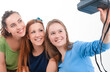© danmorgan12 - Youth Lifestyle Concept. Three Beautiful Caucasian Ladies Taking Selfie Photos.