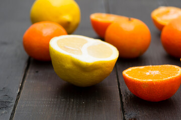 Wall Mural - Fruits on black wood table