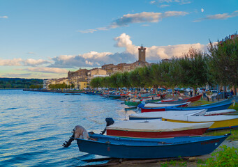 Marta (Italy) - A little medieval town on Bolsena lake with suggestive tower in stone; province of Viterbo, Lazio region. Here a view at sunset.