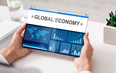 Poster - Businesswoman Using Tablet Working With Economics Statistics In Modern Office