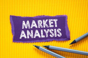Canvas Print - MARKET ANALYSIS concept. Text on torn, colored paper on corrugated background