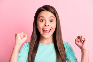 Sticker - Photo of funny amazed cute lovely small latin lady long hairdo surprised raise arms fists open mouth wear casual stylish trendy turquoise teal sweatshirt isolated pink color background