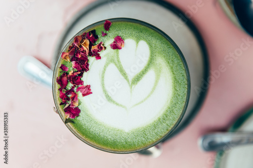 Fotomural Glass of Super Latte such as Rose Matcha from Organic Japanese green tea powder infused with rose water