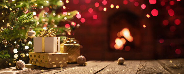 Wall Mural - christmas tree with decorations near a fireplace with lights