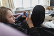 © Paul Bradbury/Caia Image - Boy playing video game with smart phone