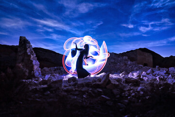 Wall Mural - Lovely Model Posing in the Desert at Night