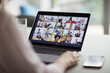 © Robert Daly/Caia Image - Colleagues video conferencing on laptop screen