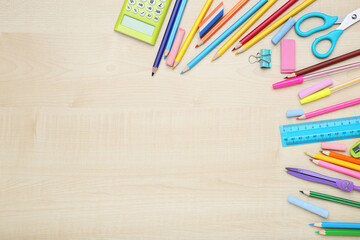 Wall Mural - Different school supplies on brown wooden table