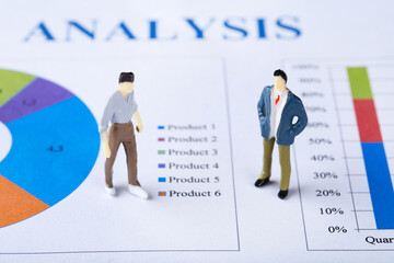 Poster - Miniature people and financial papers with graph and charts