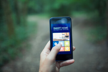 Close up POV home automation app on smart phone screen