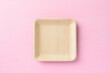 Betel palm leaf plate (Biodegradable plate, Compostable plate or Eco friendly disposable plate) on pink background