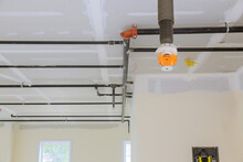Automatic Fire Sprinkler System Install On Pipe Ceiling Background