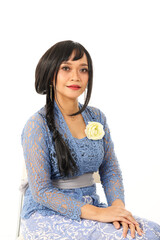 Wall Mural - South east Asian Malay race ethnic origin woman wearing dress costume blue kebaya multiracial community on white background