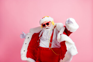 Poster - Cool x-mas christmas dance from santa claus listen jolly holly radio headphones wear suspenders sunglass headwear isolated over pastel color background