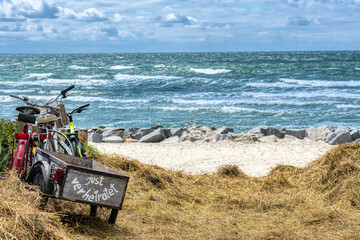 view on the baltic sea with a bicycle with the inscription JUST VERHEIRATET