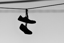 Old Sneakers Over A Power Line