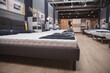 © mad_production - New orthopedic beds on display for sale at furniture supermarket