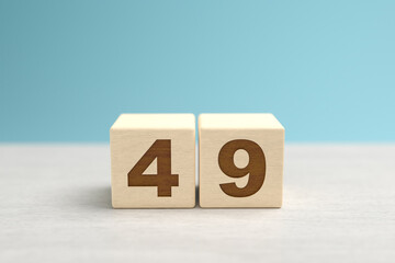 Wall Mural - Wooden toy blocks forming the number 49.