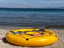 Yellow Kayak On The Beach