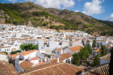 Mountains Provide The Backdrop To The White Washed Buildings Of Mijas Pueblo, Andalusia, Spain