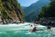© robertharding - Kayakers negotiate their way through whitewater rapids on the Karnali River in west Nepal