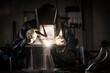 © Mauro Grigollo Photographer/Stocksy - Welder that welds aluminum in his workshop