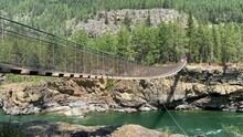 The Swinging Bridge Along The Kootenai River In The Kootenai National Forest