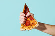© Juan Moyano/Stocksy - slice of pepperoni pizza