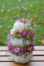 Trio Of Stacked, Small White Pumpkins Sitting On A Wood Crate.. Decorated With Pink Strawflowers And Spanish Moss. Cute Fall Decor. 