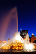 The Buckingham Fountain, in Chicago, spouts water into the night sky