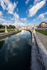 Wall Mural - Prato della Valle, famous town square in Padua downtown, one of the largest in Europe. Veneto, Italy. It is an oval square with 78 statues, 4 bridges and an island.