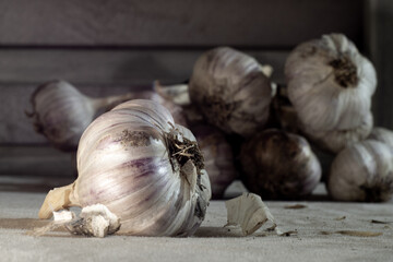 Several pieces of fresh garlic, close-up. Can be used to illustrate the beneficial properties of garlic