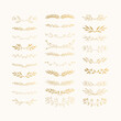 Set of hand drawn golden dividers and laurels. Vector isolated illustration.