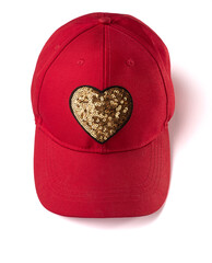 red cap with golden sequin heart patch on white background