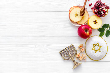 Wall Mural - Jewish cuisine for rosh hashana holiday - apple honey and pomegranate, top view