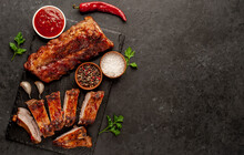  Grilled Pork Ribs With Spices On A Stone Background With Copy Space For Your Text