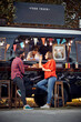 © luckybusiness - Hipster couple ordering from food truck; Urban lifestyle concept